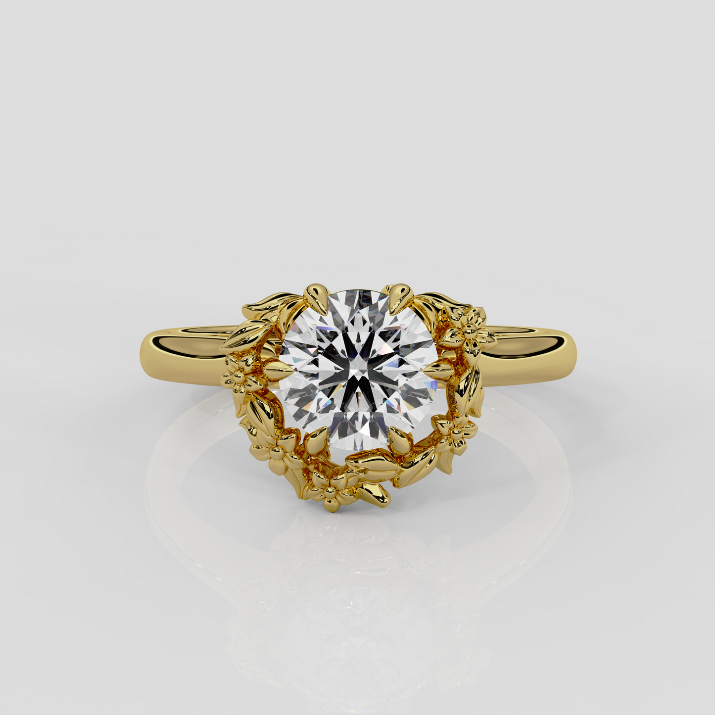18ct yellow gold halo engagement ring, Blossom by London jewellery designer, Georgina Yvonne. Natured inspired design with round brilliant cut diamond centre