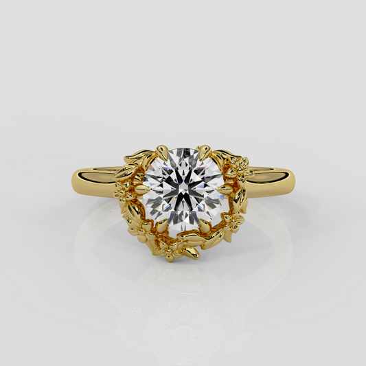 18ct yellow gold halo engagement ring, Blossom by London jewellery designer, Georgina Yvonne. Natured inspired design with round brilliant cut diamond centre