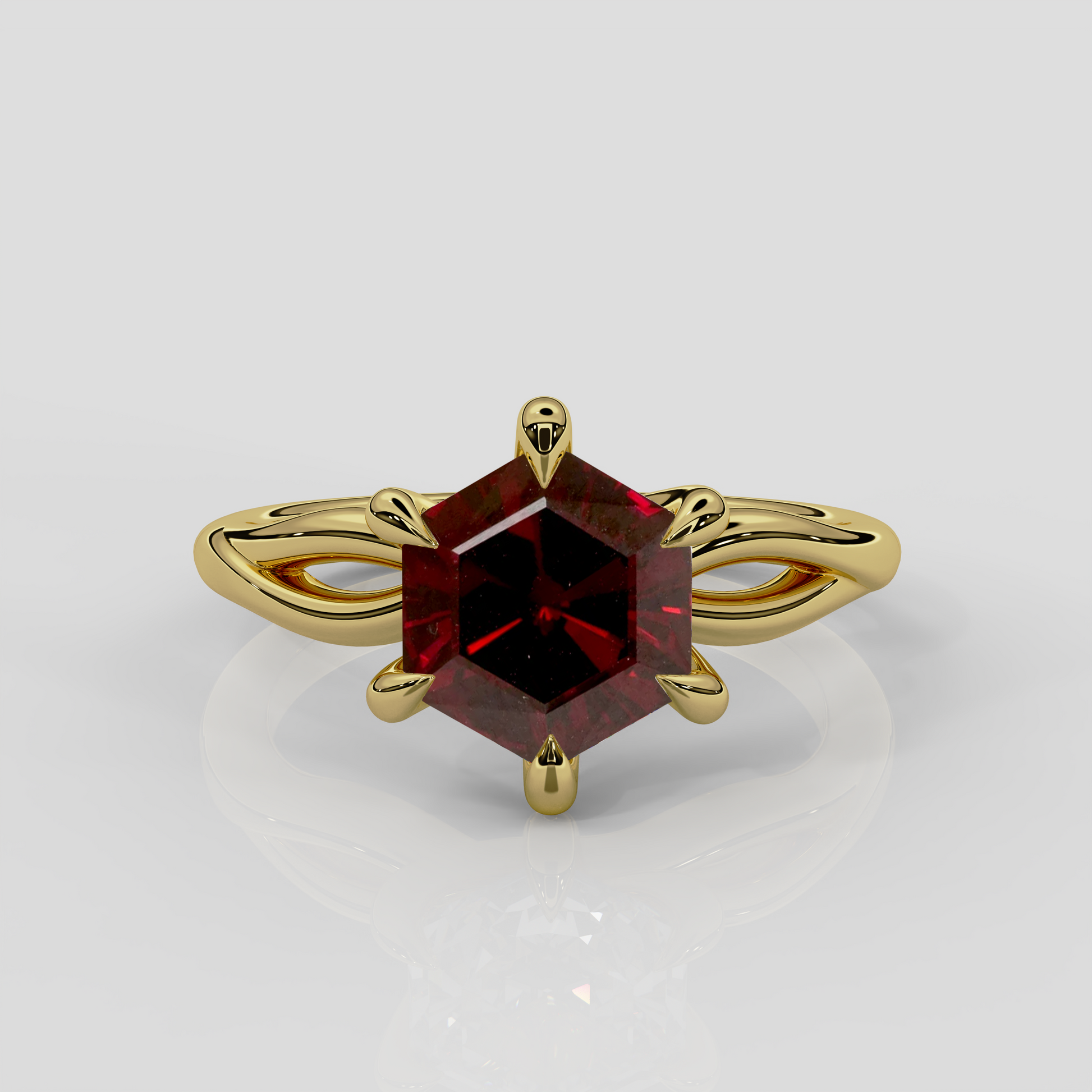 18ct yellow gold hexagon garnet engagement ring with twist band design by London jewellery designer, Georgina Yvonne
