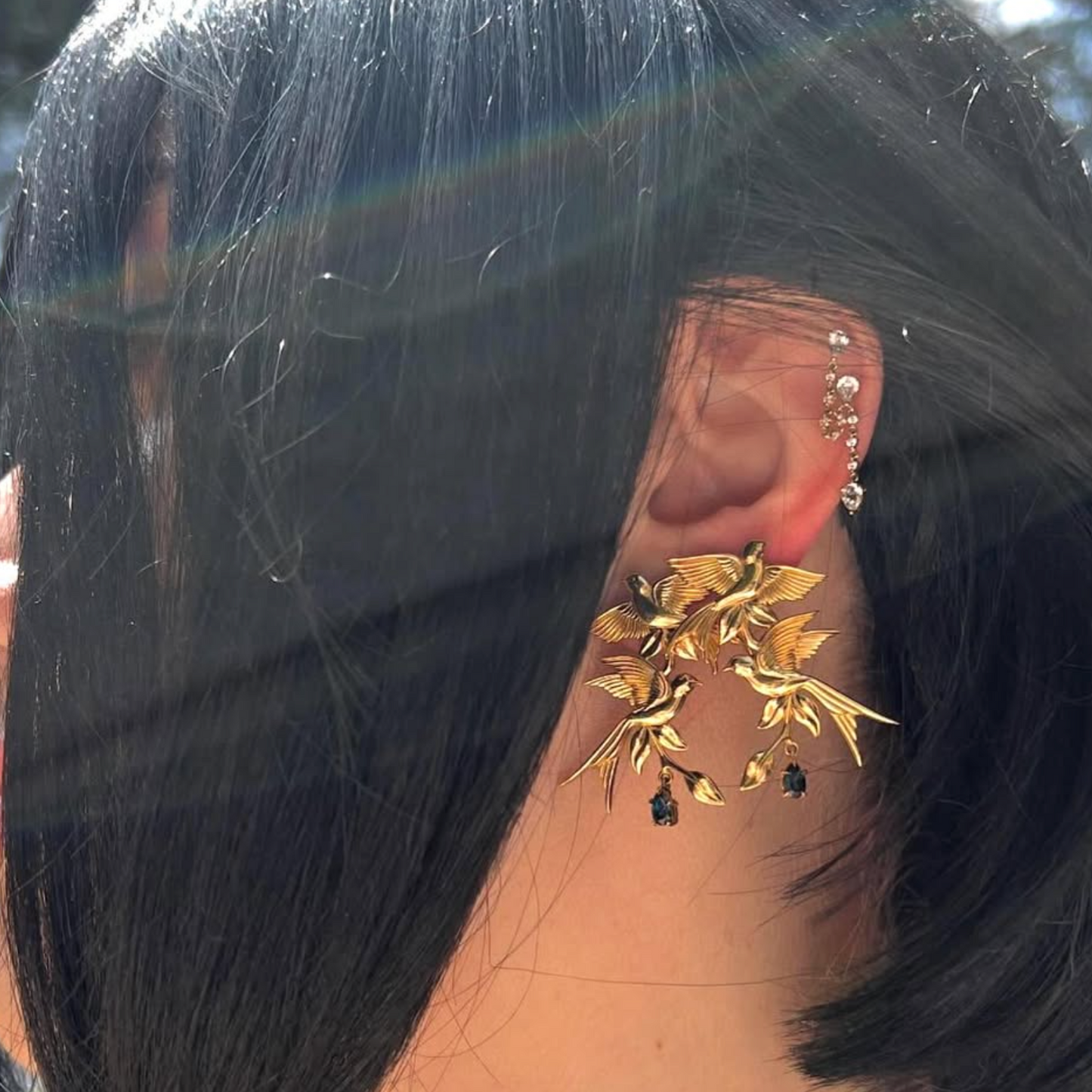 Wonderland 'Bird Song' Teal Sapphire Stud Earrings in Yellow Gold