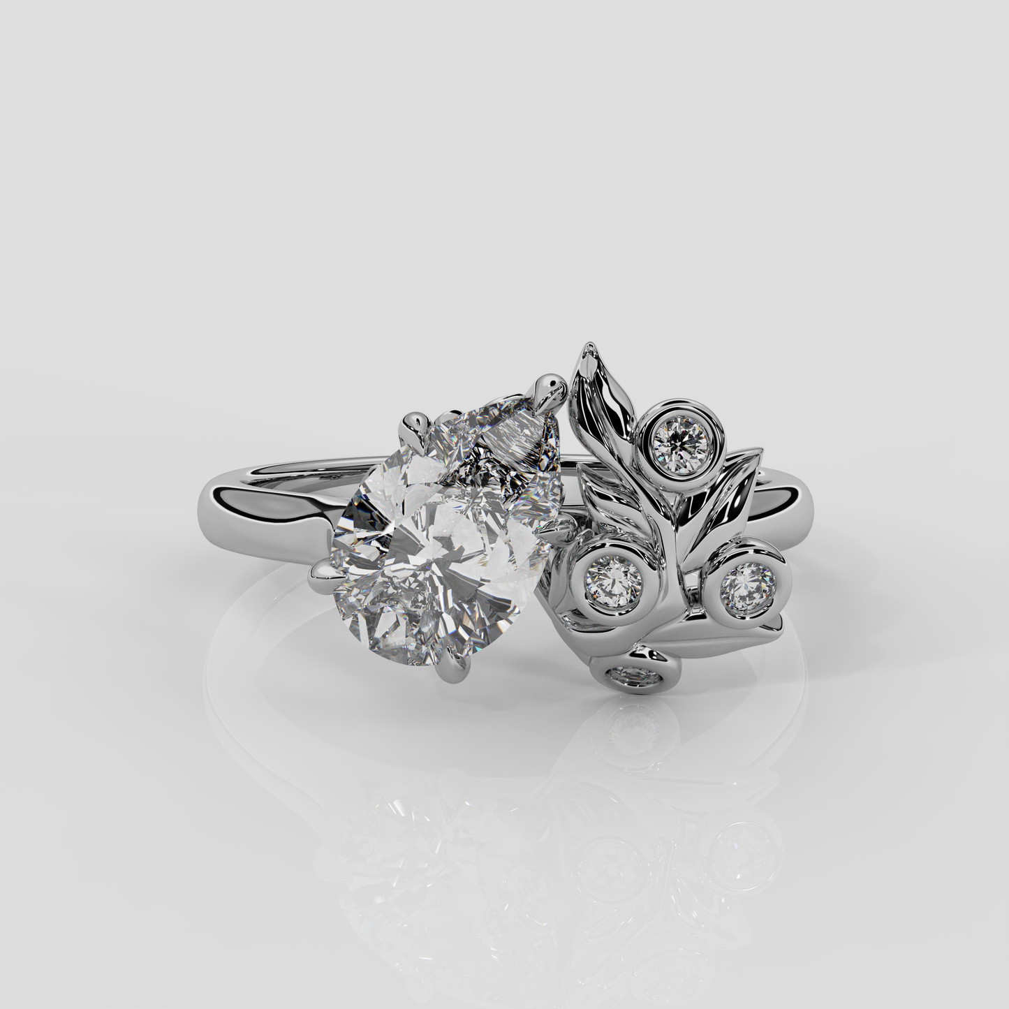 Platinum Berry Engagement Ring with pear diamond centre and diamond accent stones, nature inspired design by London jewellery designer, Georgina Yvonne