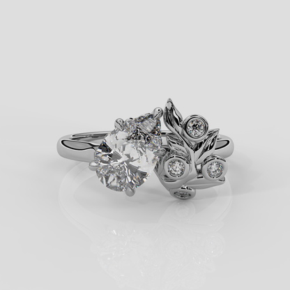 Platinum Berry Engagement Ring with pear diamond centre and diamond accent stones, nature inspired design by London jewellery designer, Georgina Yvonne