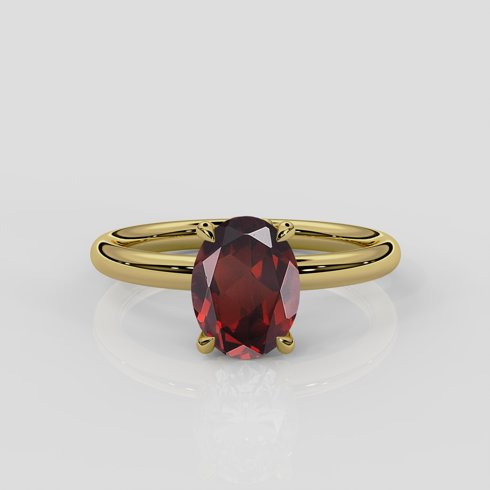 Daisy garnet solitaire engagement ring with floral gallery/floral basket. 18ct yellow gold nature inspired design with oval garnet centre stone by London jewellery designer, Georgina Yvonne 