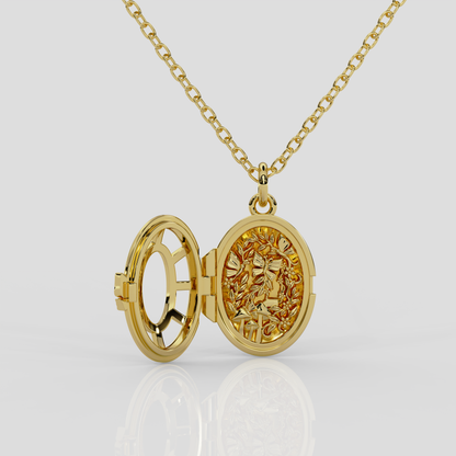 18ct yellow gold Fairytale locket from London jewellery designer, Georgina Yvonne's, award winning Wonderland jewellery collection. With fairytale inspired scene, featuring butterflies, mushrooms, and vines.
