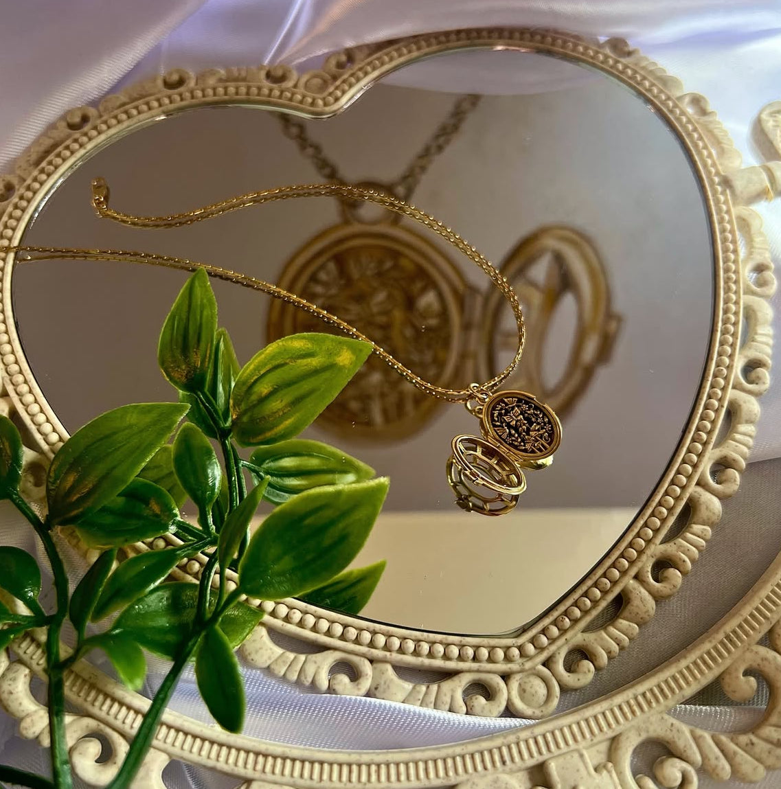 18ct yellow gold Fairytale locket from London jewellery designer, Georgina Yvonne's, award winning Wonderland jewellery collection. With fairytale inspired scene, featuring butterflies, mushrooms, and vines.