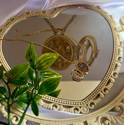18ct yellow gold Fairytale locket from London jewellery designer, Georgina Yvonne's, award winning Wonderland jewellery collection. With fairytale inspired scene, featuring butterflies, mushrooms, and vines.