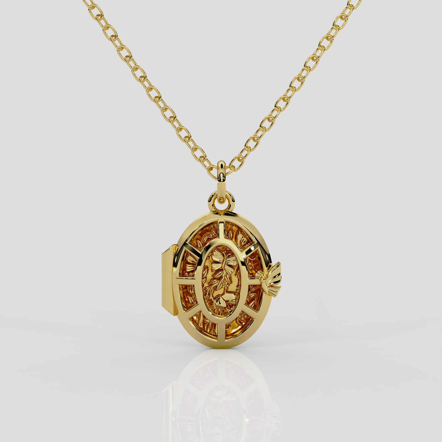 18ct yellow gold Fairytale locket from London jewellery designer, Georgina Yvonne's, award winning Wonderland jewellery collection. With fairytale inspired scene, featuring butterflies, mushrooms, and vines.
