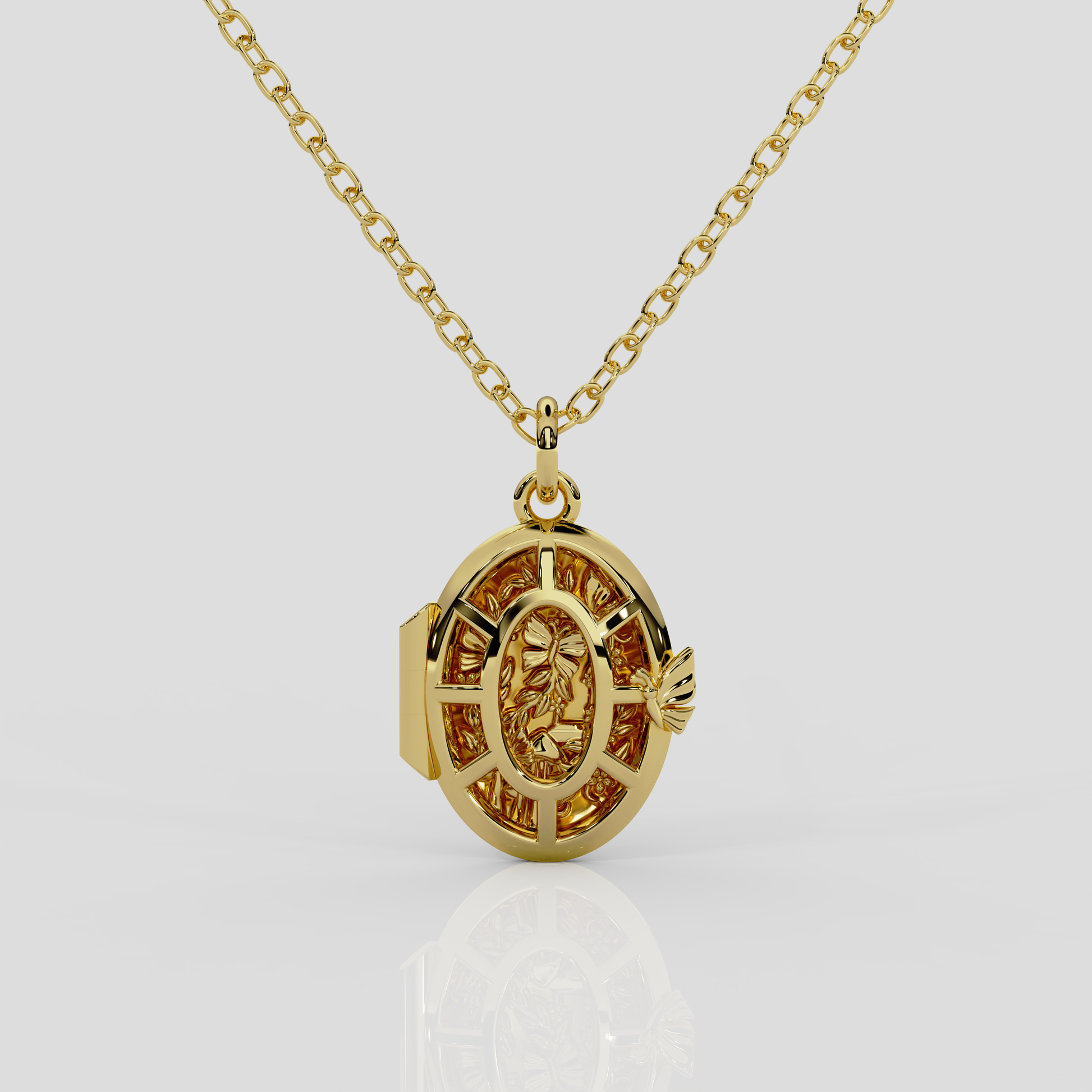 18ct yellow gold Fairytale locket from London jewellery designer, Georgina Yvonne's, award winning Wonderland jewellery collection. With fairytale inspired scene, featuring butterflies, mushrooms, and vines.