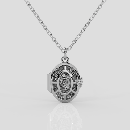 Platinum Fairytale Locket from London jewellery designer, Georgina Yvonne's, award winning Wonderland jewellery collection. With butterfly and enchanted forest scene. 
