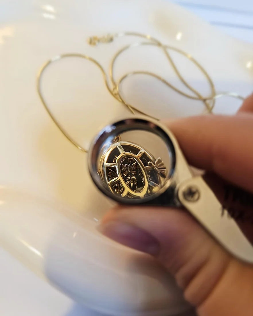 18ct yellow gold Fairytale locket from London jewellery designer, Georgina Yvonne's, award winning Wonderland jewellery collection. With fairytale inspired scene, featuring butterflies, mushrooms, and vines.